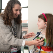 dr. cara marshall working with patient